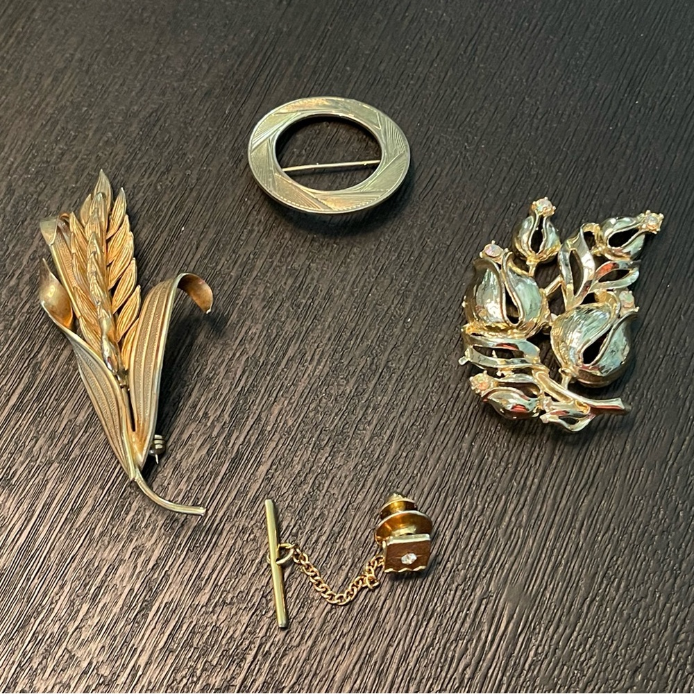 Bundle of Gold brooches